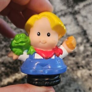 Fisher-Price Little People Eddie figure  holding a frog And A Brush